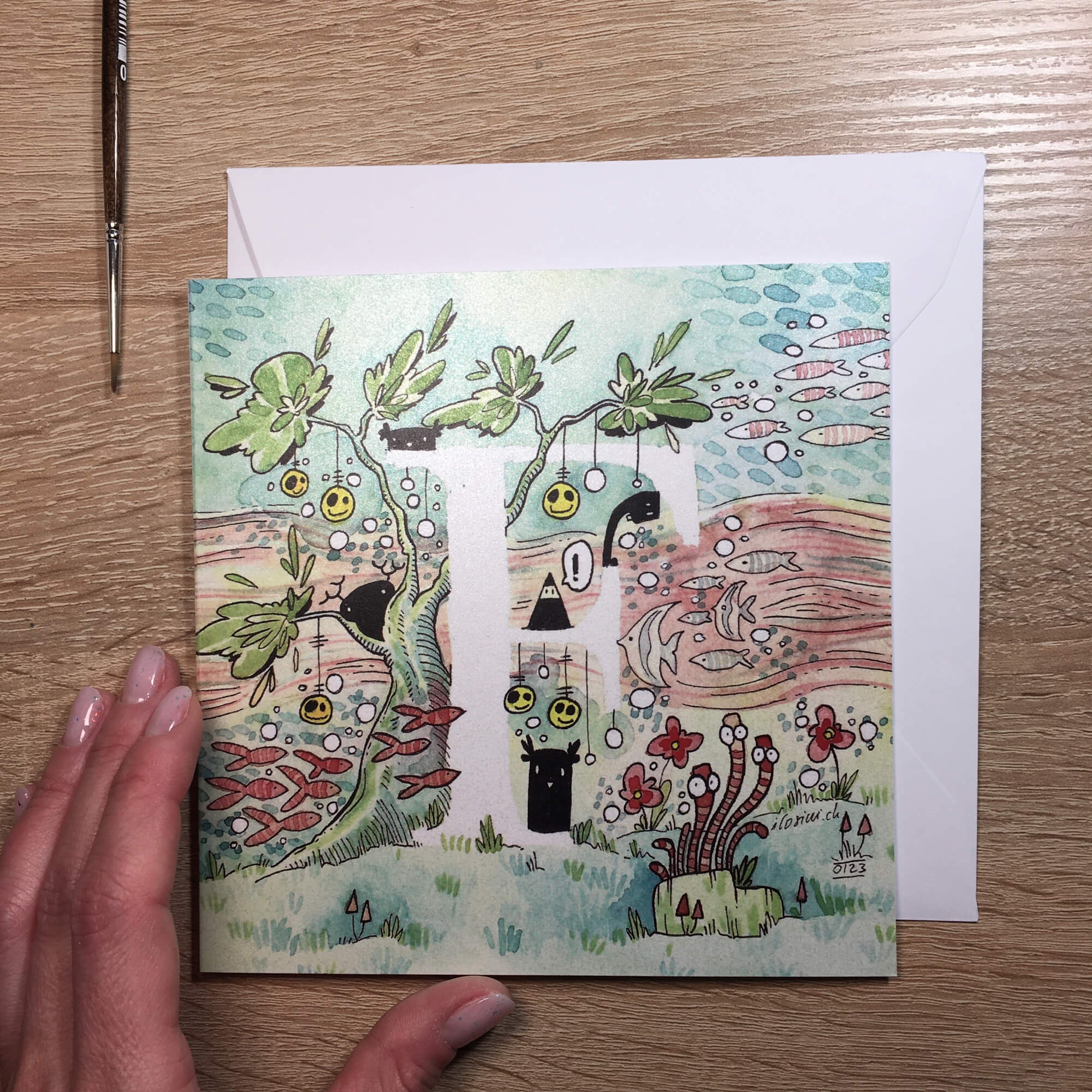 Card with first letter of name: F