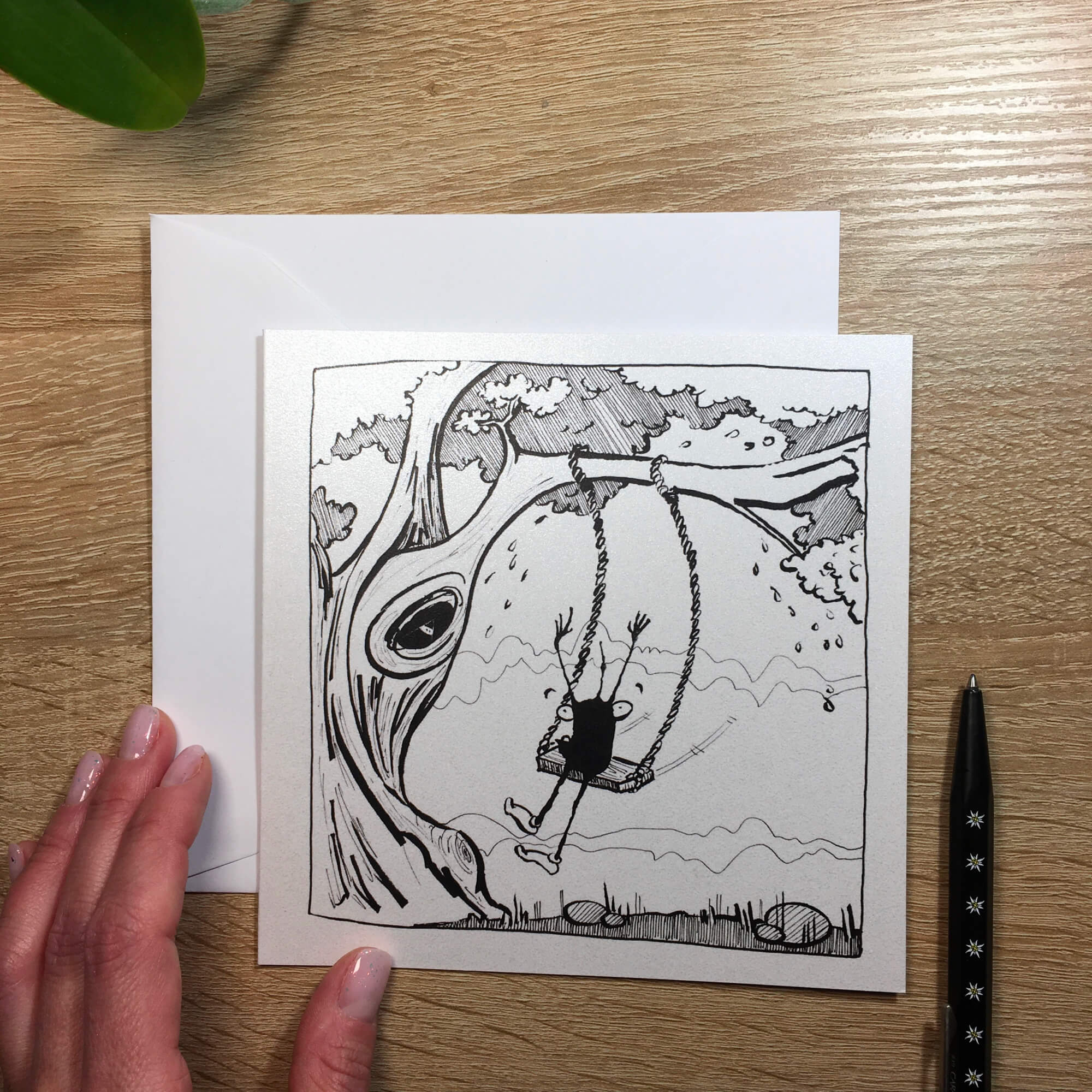 Ticket with ink stain: a little monster goes on a swing