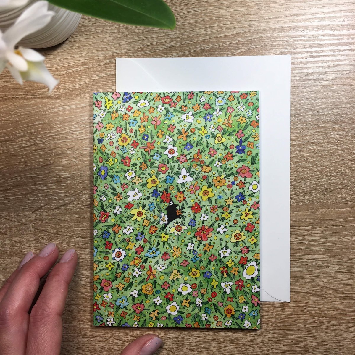 Greeting card with coloured flowers
